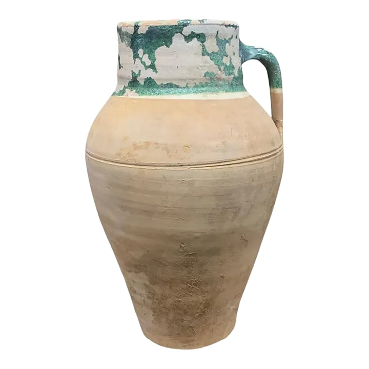 Vintage Turkish Terracotta Oil Jar: Hailing from the mountains of Anatolia and Konya in Turkey, these oil jars have a very transitional appeal. Each one is so wonderfully unique with its glaze and terra cotta color. You are buying a