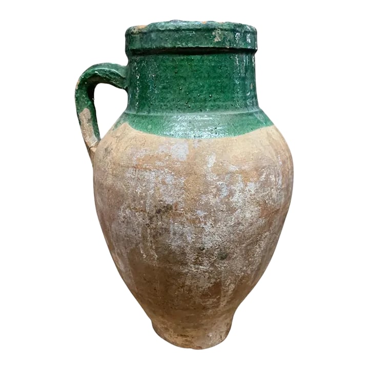 Vintage Turkish Terracotta Oil Jar: Hailing from the mountains of Anatolia and Konya in Turkey, these oil jars have a very transitional appeal. Each one is so wonderfully unique with its glaze and terra cotta color. You are buying a