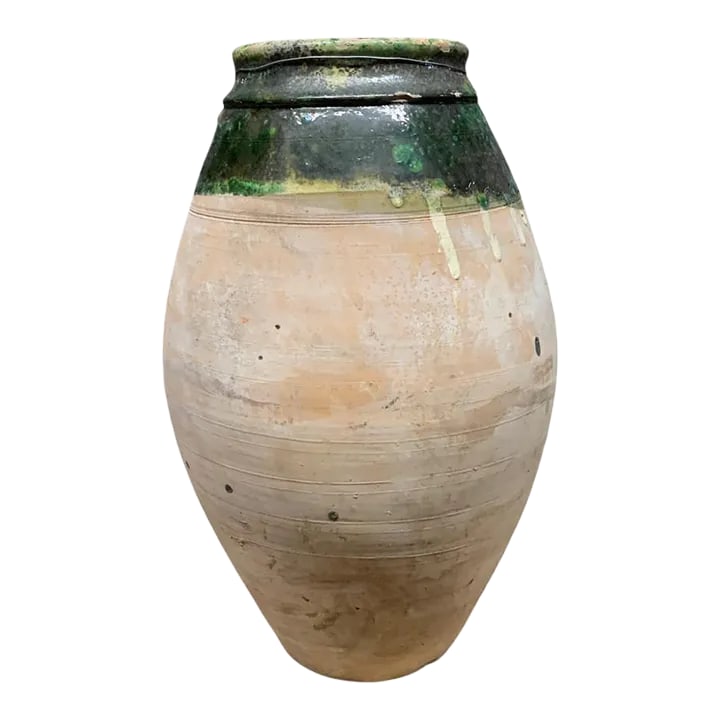 Vintage Turkish Terracotta Oil Jar: Hailing from the mountains of Anatolia and Konya in Turkey, these oil jars have a very transitional appeal. Each one is so wonderfully unique with its glaze and terra cotta color. You are buying a