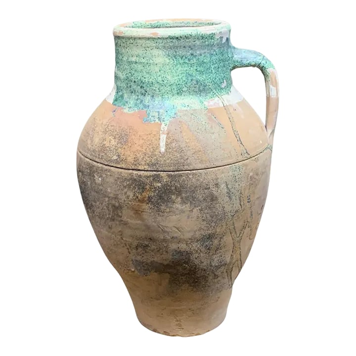 Vintage Turkish Terracotta Oil Jar: Hailing from the mountains of Anatolia and Konya in Turkey, these oil jars have a very transitional appeal. Each one is so wonderfully unique with its glaze and terra cotta color. You are buying a