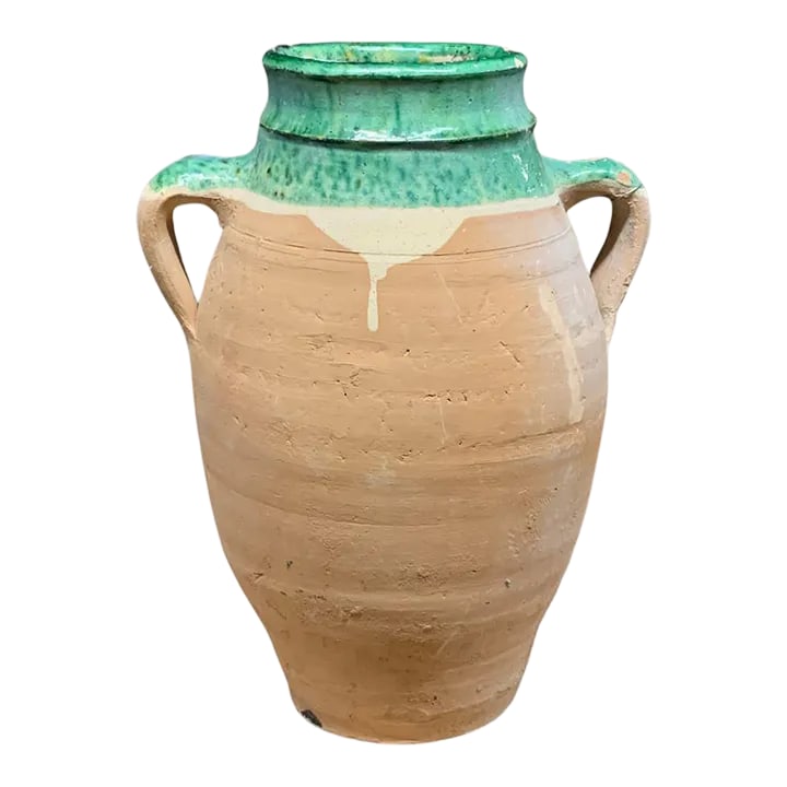 Vintage Turkish Terracotta Oil Jar: Hailing from the mountains of Anatolia and Konya in Turkey, these oil jars have a very transitional appeal. Each one is so wonderfully unique with its glaze and terra cotta color. You are buying a