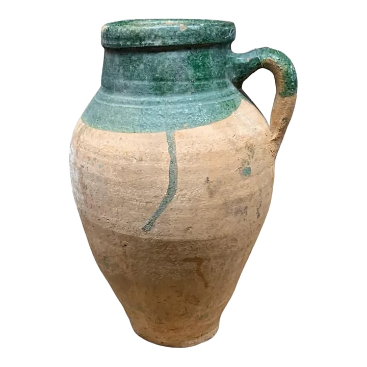 Vintage Turkish Terracotta Oil Jar: Hailing from the mountains of Anatolia and Konya in Turkey, these oil jars have a very transitional appeal. Each one is so wonderfully unique with its glaze and terra cotta color. You are buying a