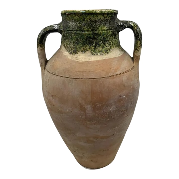 Vintage Turkish Terracotta Oil Jar: Hailing from the mountains of Anatolia and Konya in Turkey, these oil jars have a very transitional appeal. Each one is so wonderfully unique with its glaze and terra cotta color. You are buying a