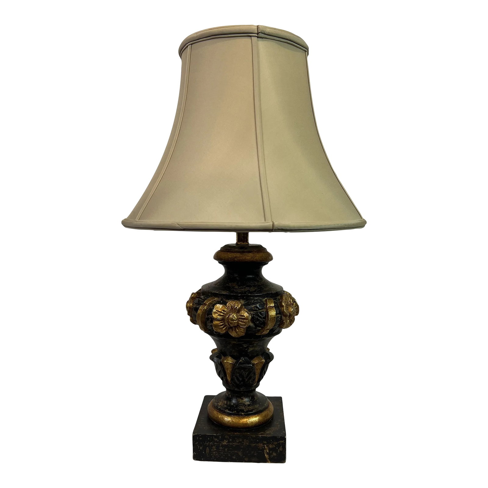 1990s Italian Wood Carved Lamp in Distressed Black Color: Wood carved lamp in a distressed black color with gold leaf accents. Created in Italy. Condition: Alterations: Original Condition Unaltered Imperfections: Some Imperfections Condition Notes: