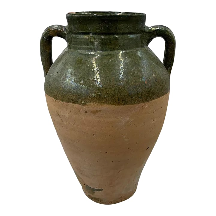 Turkish Terracotta Oil Jar: Hailing from the mountains of Anatolia and Konya in Turkey, these oil jars have a very transitional appeal. Each one is so wonderfully unique with its glaze and terra cotta color. You are buying a
