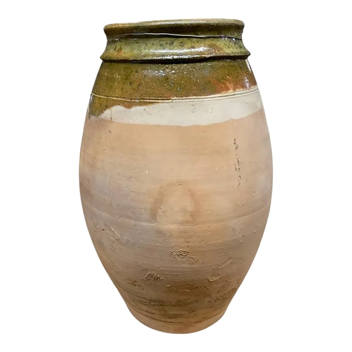 Vintage Turkish Terracotta Oil Jar: Hailing from the mountains of Anatolia and Konya in Turkey, these oil jars have a very transitional appeal. Each one is so wonderfully unique with its glaze and terra cotta color. You are buying a