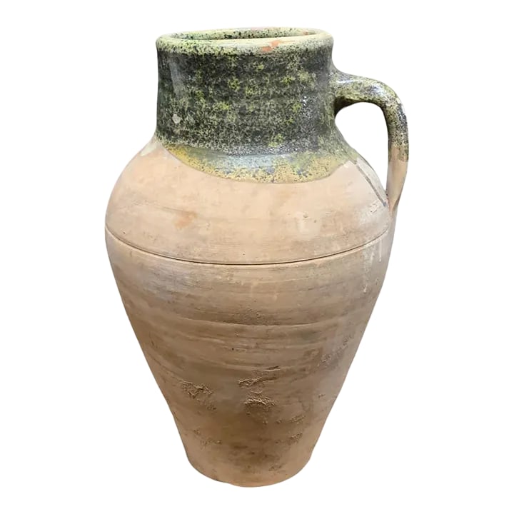 Vintage Turkish Terracotta Oil Jar: Hailing from the mountains of Anatolia and Konya in Turkey, these oil jars have a very transitional appeal. Each one is so wonderfully unique with its glaze and terra cotta color. You are buying a