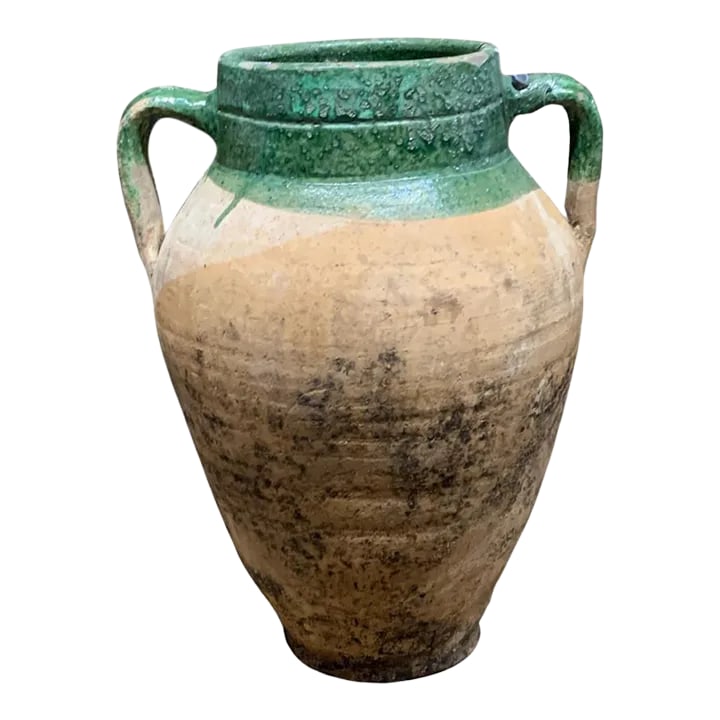 Vintage Turkish Terracotta Oil Jar: Hailing from the mountains of Anatolia and Konya in Turkey, these oil jars have a very transitional appeal. Each one is so wonderfully unique with its glaze and terra cotta color. You are buying a