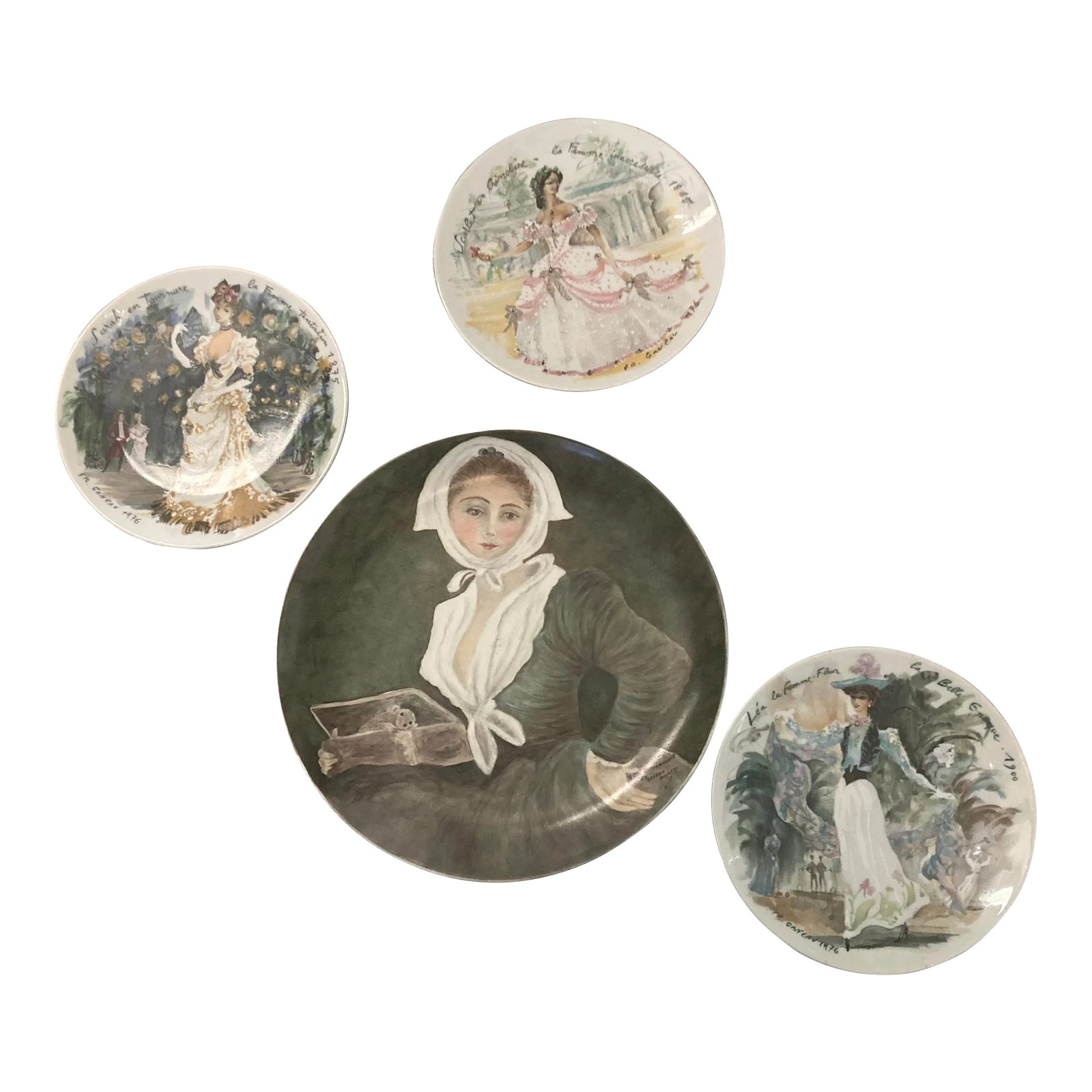 1970s Female Figural Decorative Plates, Set of 4: Beautiful collection of female/women's decorative plates. The set of 4 includes one larger plate reproduction of Girl with Marmot by Jean-Honore Fragonard and 1970s D'Arceau Limoges porcelain plates f