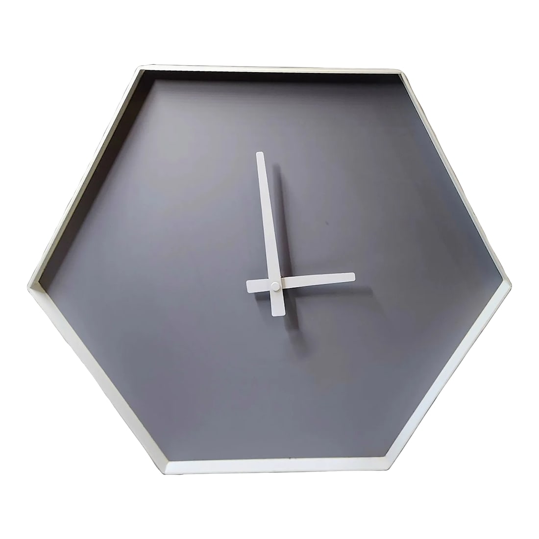 Swarm Wall Clock by CB2: A simple modern style clock with 6 sides made of metal weighing in at a heavy-duty 4 lbs. Built to last. You can feel the quality when you hold it. No numbers on it. Looks amazing on a darker colored