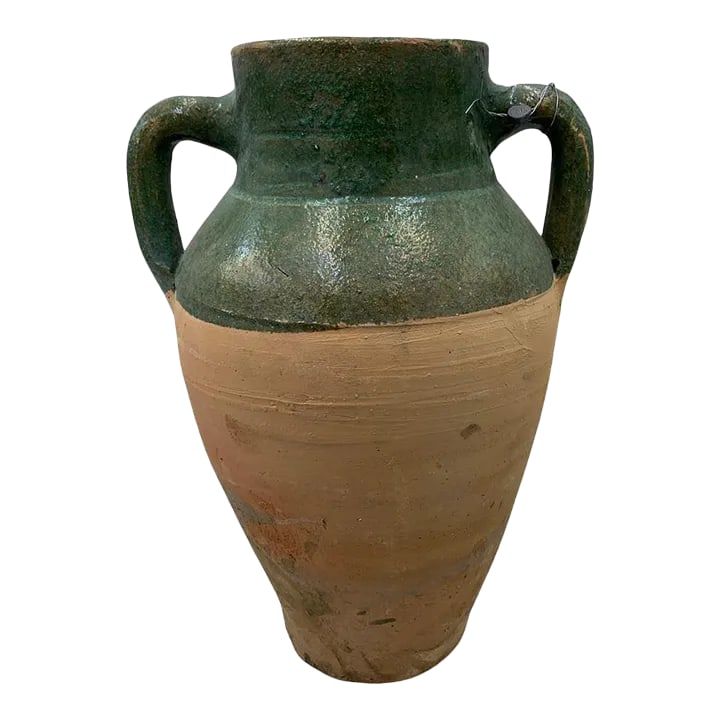 Turkish Terracotta Oil Jar: Hailing from the mountains of Anatolia and Konya in Turkey, these oil jars have a very transitional appeal. Each one is so wonderfully unique with its glaze and terra cotta color. You are buying a