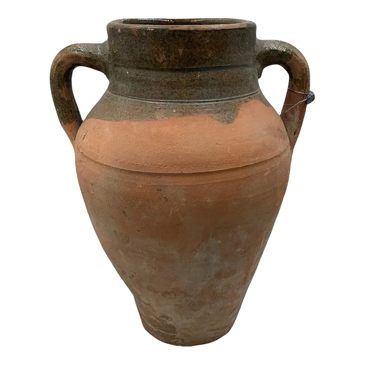 Vintage Turkish Terracotta Oil Jar: Hailing from the mountains of Anatolia and Konya in Turkey, these oil jars have a very transitional appeal. Each one is so wonderfully unique with its glaze and terra cotta color. You are buying a