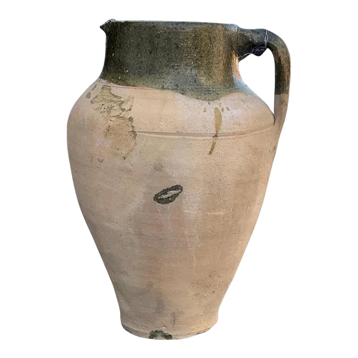 Vintage Turkish Terracotta Oil Jar: Hailing from the mountains of Anatolia and Konya in Turkey, these oil jars have a very transitional appeal. Each one is so wonderfully unique with its glaze and terra cotta color. You are buying a