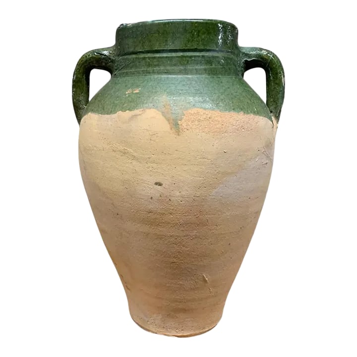 Vintage Turkish Terracotta Oil Jar: Hailing from the mountains of Anatolia and Konya in Turkey, these oil jars have a very transitional appeal. Each one is so wonderfully unique with its glaze and terra cotta color. You are buying a