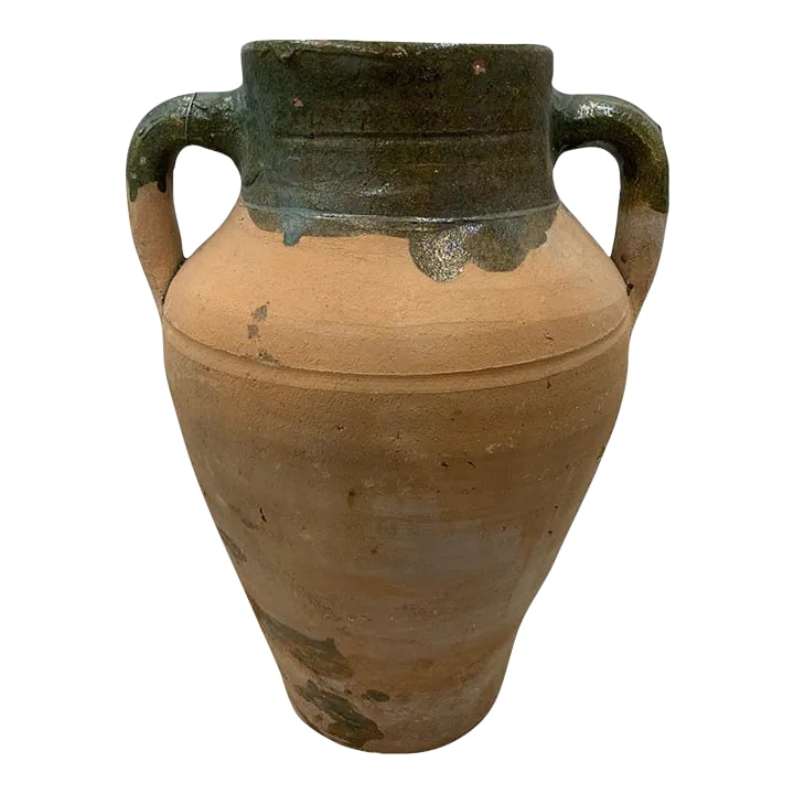 Turkish Terracotta Oil Jar: Hailing from the mountains of Anatolia and Konya in Turkey, these oil jars have a very transitional appeal. Each one is so wonderfully unique with its glaze and terra cotta color. You are buying a