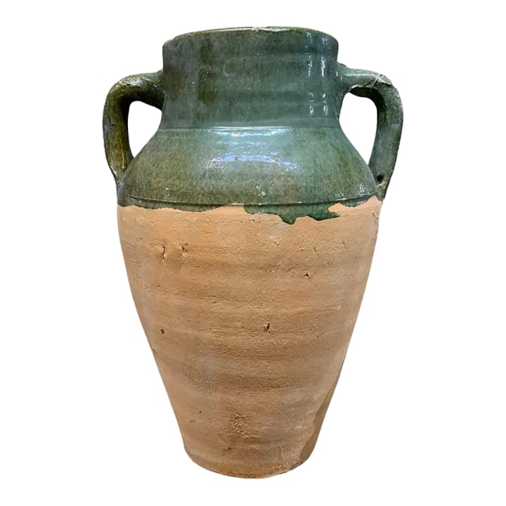 Vintage Turkish Terracotta Oil Jar: Hailing from the mountains of Anatolia and Konya in Turkey, these oil jars have a very transitional appeal. Each one is so wonderfully unique with its glaze and terra cotta color. You are buying a pie