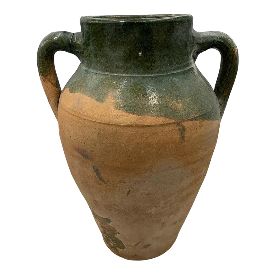 Turkish Terracotta Oil Jar: Hailing from the mountains of Anatolia and Konya in Turkey, these oil jars have a very transitional appeal. Each one is so wonderfully unique with its glaze and terra cotta color. You are buying a pie
