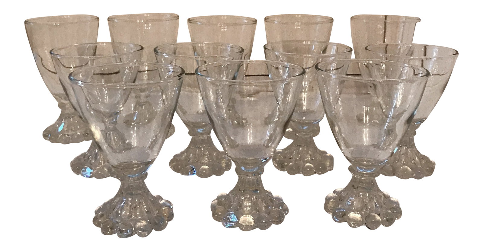 1940's Vintage Boobie Glasses- Set of 12: Set Of 12 Boobie Glasses that include 2 sizes. 5 of the 3 in depth, and 7 of the 2 in depth, The width is the same on both 2.5 inches. Made by the Imperial Glass Co. Condition: Alterations: Original