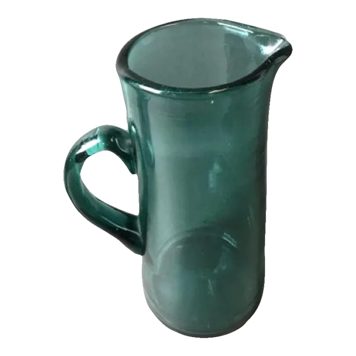 Mid 20th Century Teal Blue Handblown Glass Pitcher: This very pretty pitcher is perfect for margaritas or can also be used as a vase. Condition: Alterations: Original Condition Unaltered Imperfections: Some Imperfections Condition Notes: The pitcher