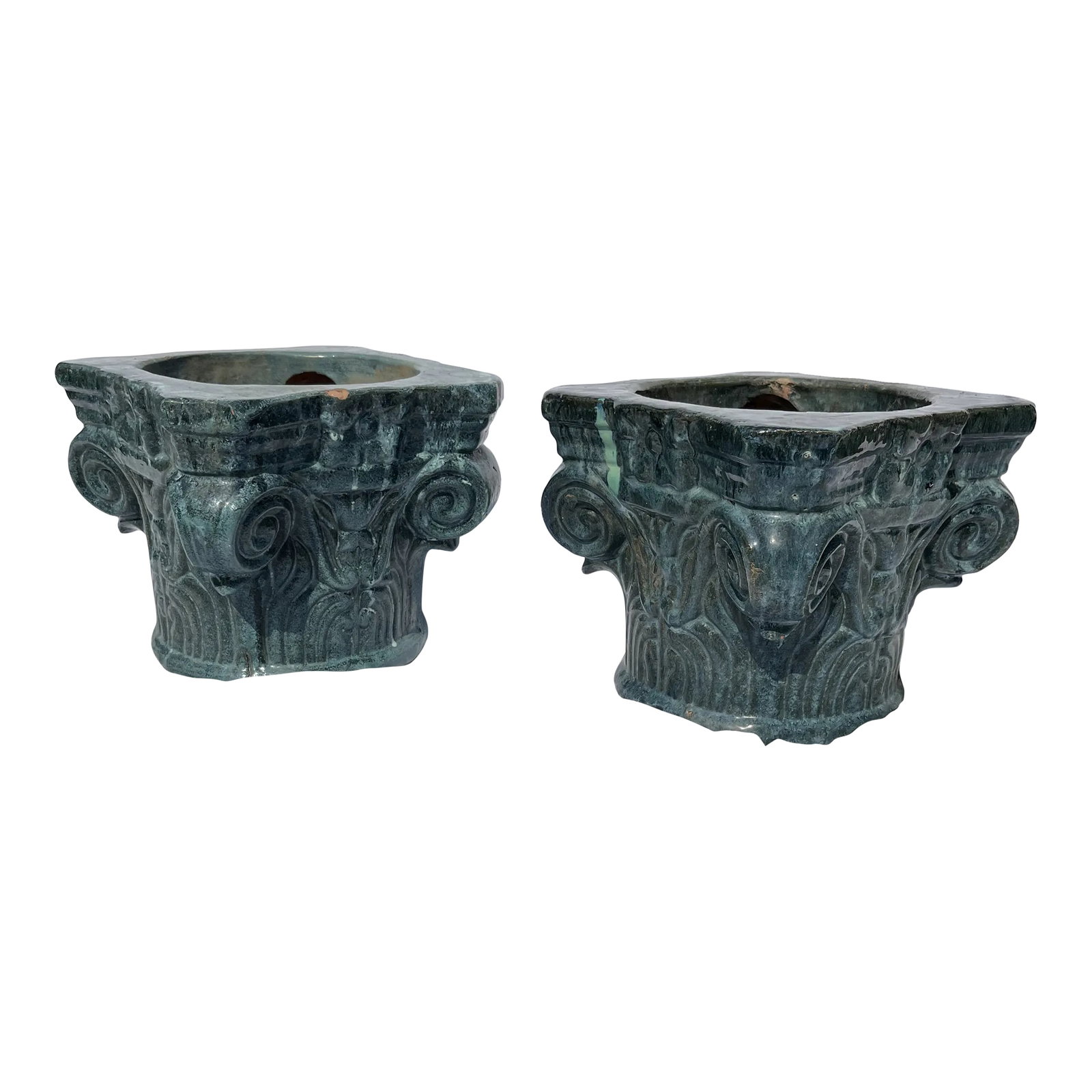 Terracotta Column Capital Planters a Pair: A matching pair of terra cotta planters or pots in the form of a classical column capital with greenish blue glazed finish. Condition: Alterations: Original Condition Unaltered Imperfections: Some Imp
