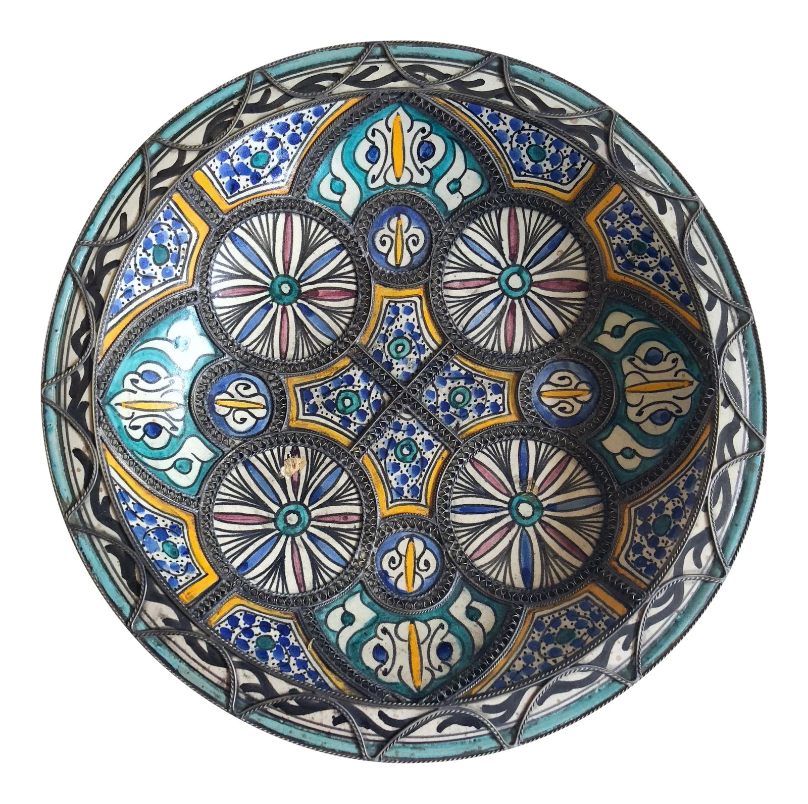 Moroccan Handcrafted Ceramic Bowl: Handcrafted large Moroccan decorative ceramic plate from Fez. Traditional designs hand-painted by artist in Fez with geometrical and floral patterns adorned with intricate nickel silver filigree