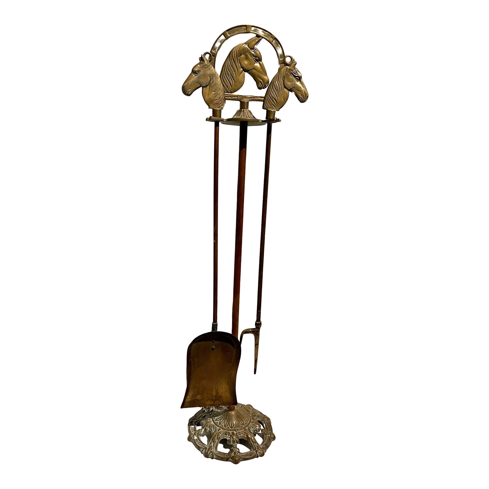 Solid Brass Fireplace Tools with Horse Head Handles & Stand - Set of 3: Solid Brass fireplace tools, a poker and a shovel with handles and a stand that have carved horse heads . Each handle also has eyelets for hanging elsewhere if necessary. Wonderful for a cabin,
