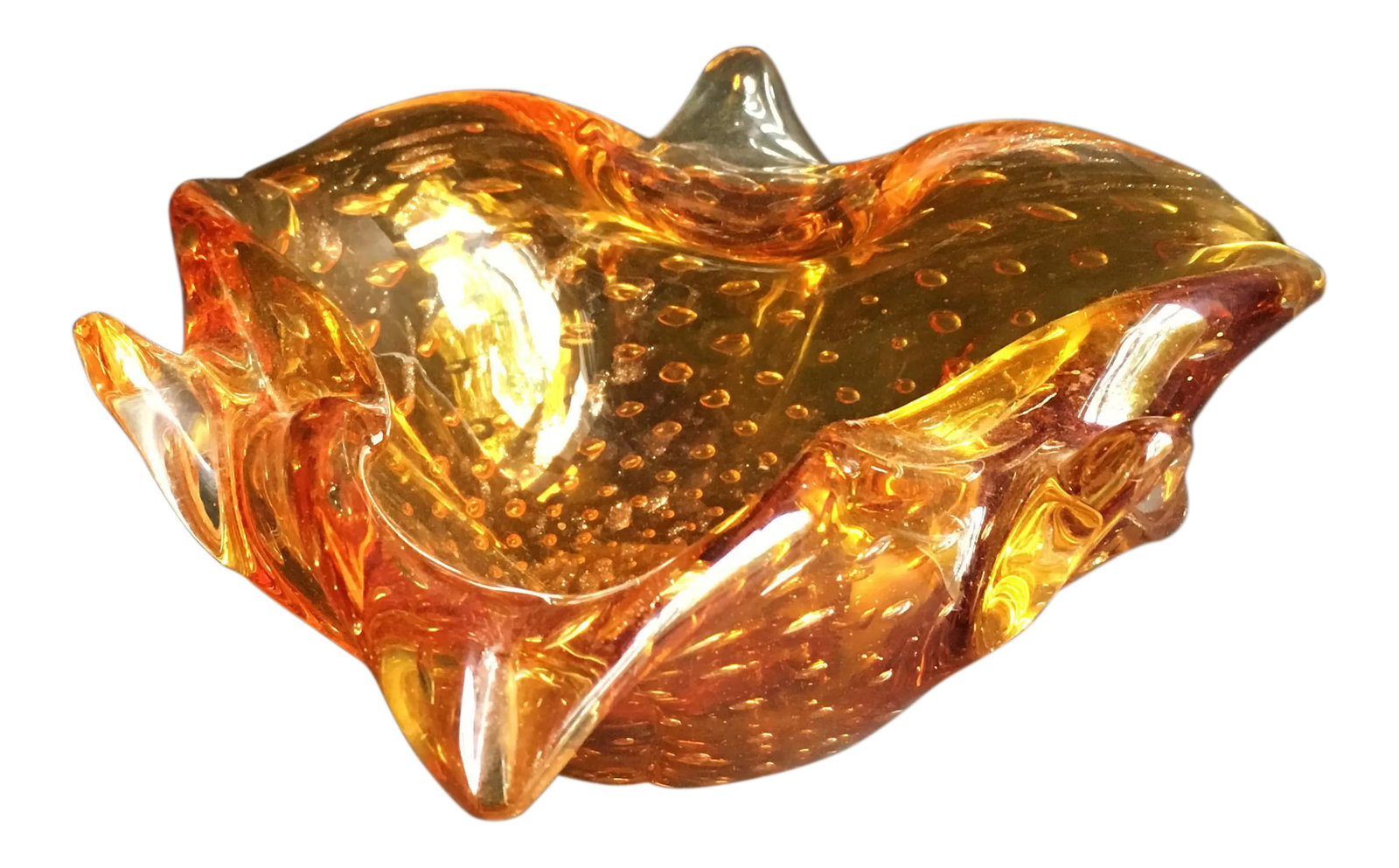 1950s Mid-Century Modern Amber Murano Glass Organic Shaped Bowl: Amber mid century Venetian / Murano glass bowl with bullicante controlled bubble design and gold foil inclusions. The light scratches on the very bottom of the ground glass base indicates age as you w