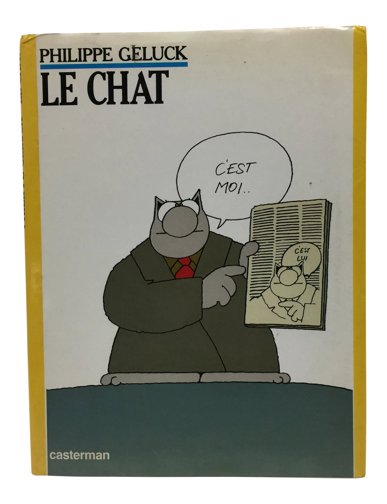1986 Le Chat the Cat Book by Philippe Geluck: Paris: Casterman, 1986. First edition. Hard cover with dust jacket (not price clipped). Text in French. Large 4to. 75 pp. Images in black and white with color accents. Cat cartoons in a lovely coffee