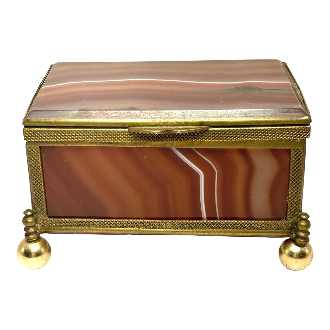 French Red Agate & Ormolu Box: Antique Red Agate & Ormolu Box, Having A Molded Edge Agate Top Encased In An Perforated Ormolu Frame, Opening To Conforming Body, Ending On Rounded Feet. Late 19th century H. 1.78 in. W. 3 in. D. 2