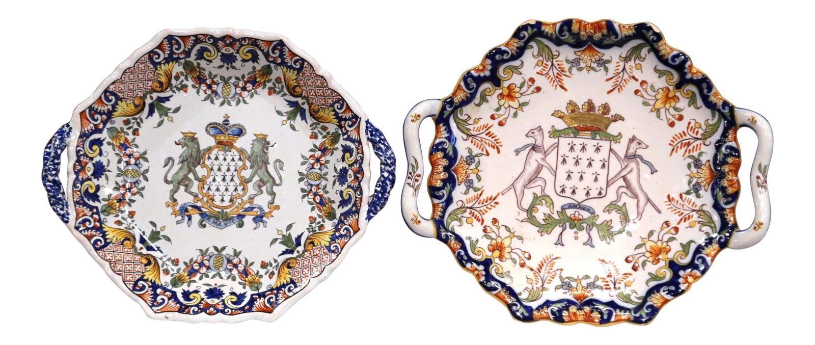 Two Mid-20th Century French Hand-Painted Faience Decorative Plates From Brittany: Decorate a shelf or a wall with these colorful antique decorative plates from Brittany, France. Crafted circa 1930, each faience plate has handles and features a hand-painted centre crest. The plates