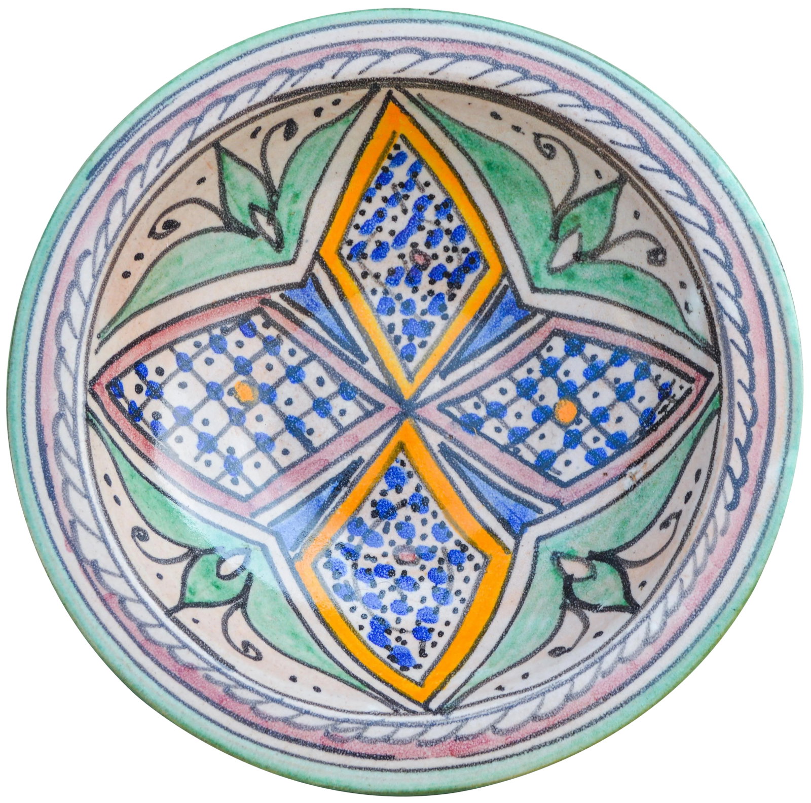 Early 20th Century Colorful Moorish Ceramic Plate: Handcrafted ceramic plate featuring an elaborate hand-painted Moorish pattern in a traditional Andalusian color combination. Made in Fez, Morocco. No maker's mark. Hole on reverse for hanging.