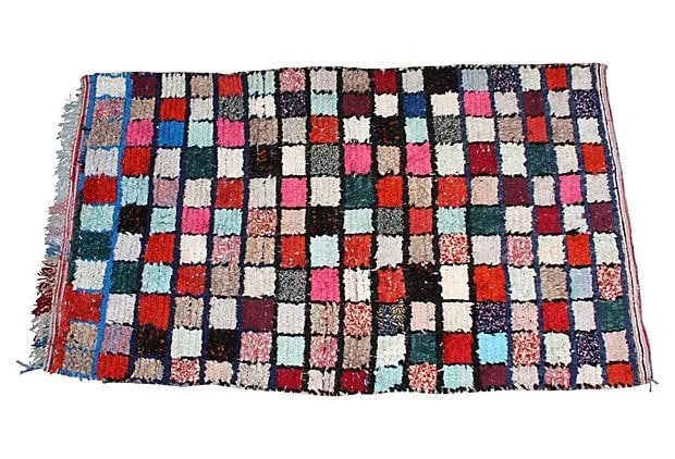 Mid 20th Century Moroccan Rug - 8' X 4'5": The Berbers created the first boucherouite rugs in the 20th century, weaving cotton, fabrics and wool into vivid patterns. With its colorful magic squares, ornate stripes and plush texture, this rug