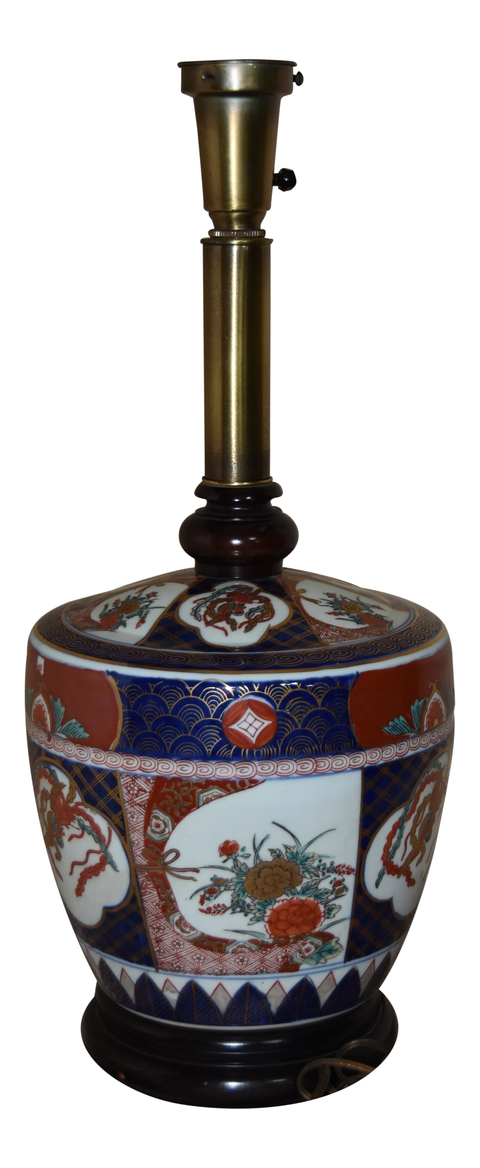 Japanese Imari Porcelain & Wood Lamp: Fantastic Asian lamp in excellent working condition. This lamp is truly stunning. There's a few small spots chipped enamel on the body. 31" Wide all around 23" Top to bottom 10" Wide Condition: Altera