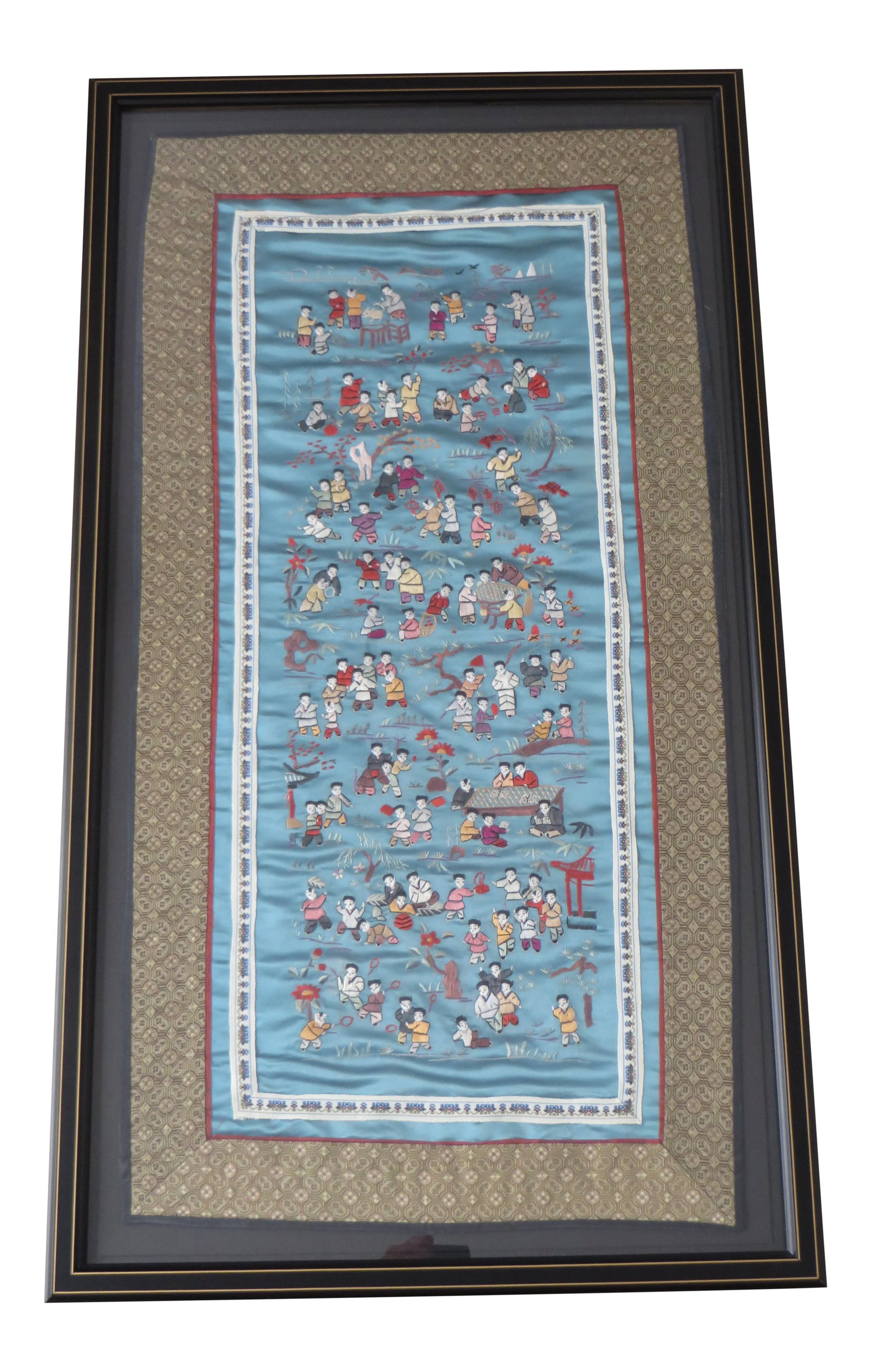 Reproduction Chinese Silk Embroidery Playing Children Motif Textile Art: This is a Chinese embroidery, copy of an old silk embroidery, depicting playing children. Measurements: frame 28 1/4" x 15 3/4"; embroidered silk 21 3/4" x 9 1/4" Condition: Alterations: Original Cond
