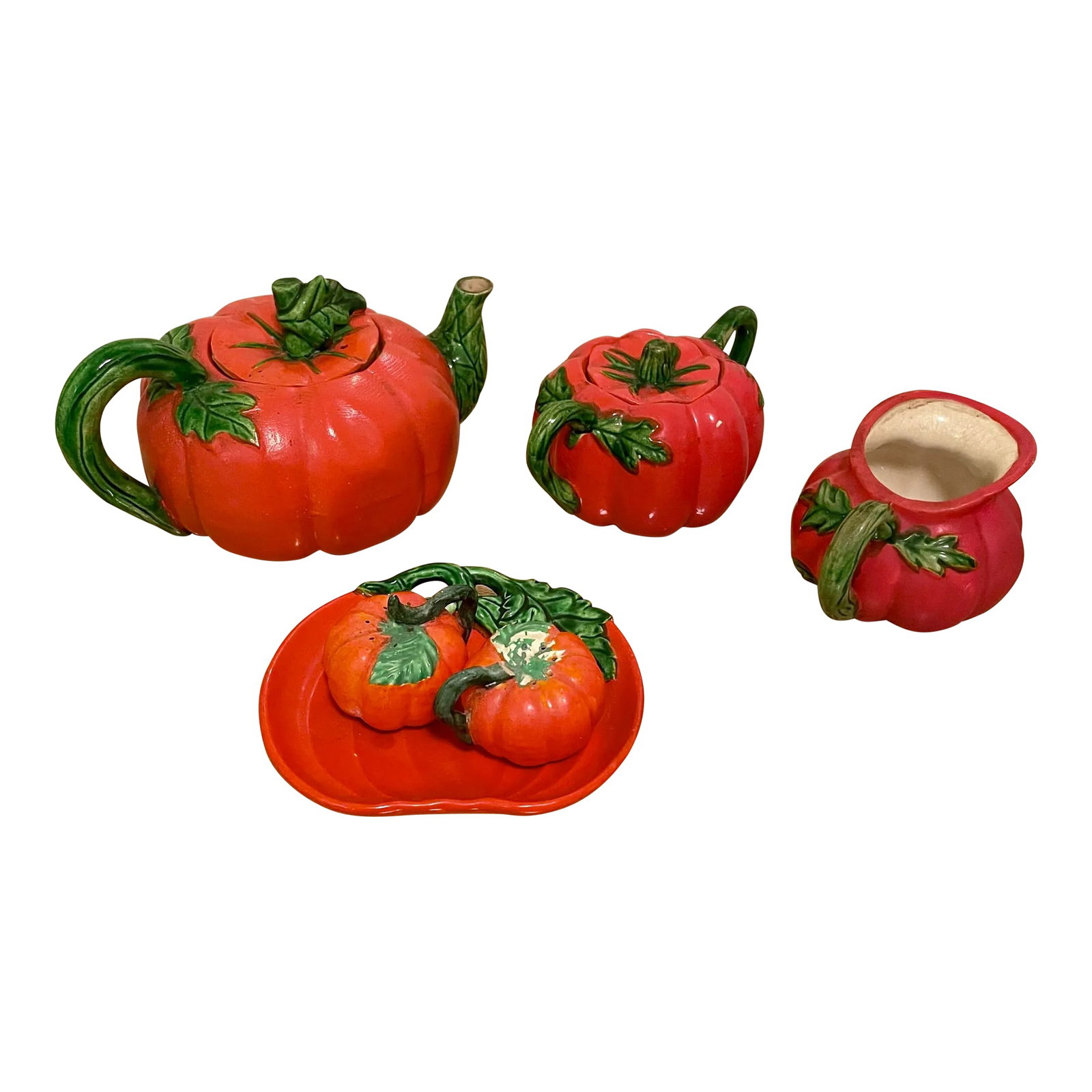 Vintage Tomato Breakfast Set: Add a bit of whimsy to your table! This lovely set is made in Japan and is a bright orange and green. Set is a tea pot, lidded sugar bowl, creamer, small dish and pepper and salt shakers. All pieces