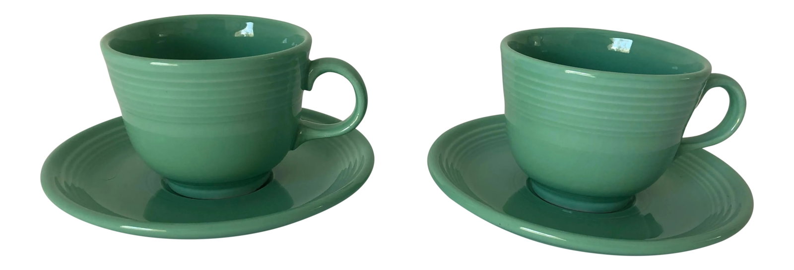 Fiesta Ware Green Coffee Cups & Saucers - a Pair: Fiesta Ware Green Coffee Cups & Saucers s-2 Condition: Alterations: Original Condition Unaltered Imperfections: Some Imperfections Condition Notes: Excellent Origin: United States Materials &