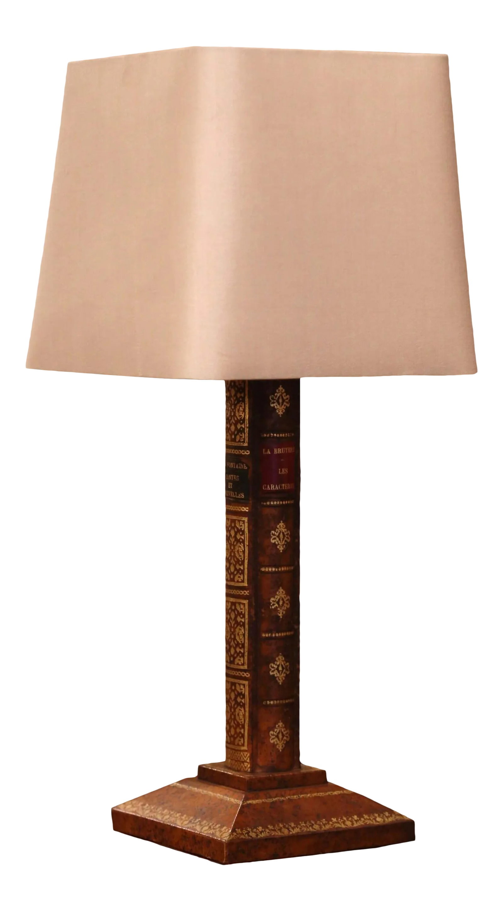 Mid-Century French Leather Faux Book Table Lamp With Shade: Bring a refined literary accent to a desk, library, or bedside with this distinctive French table lamp, crafted circa 1970. The sculptural base is designed as a stack of faux leather-bound books,