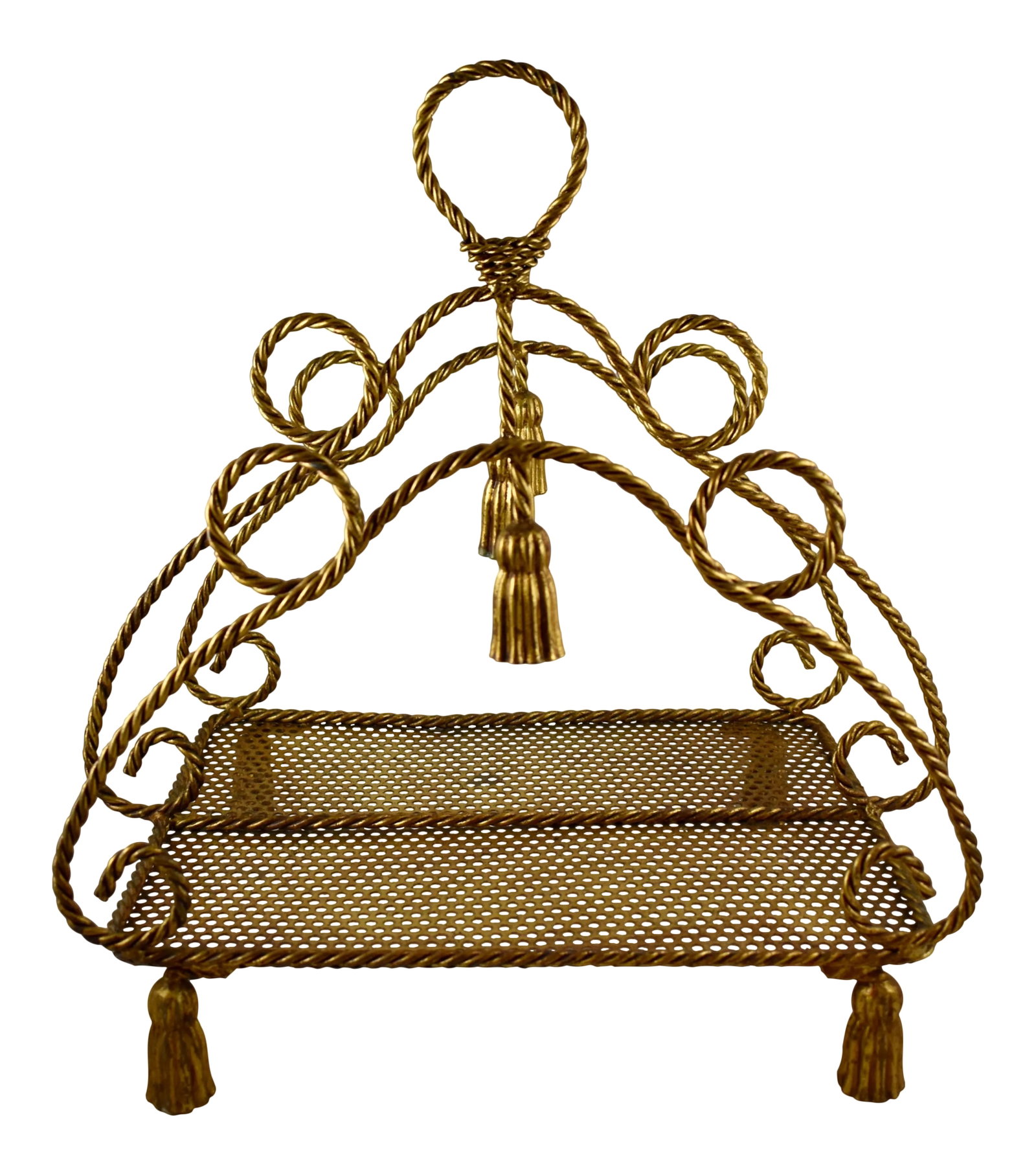 Mid-Century Hollywood Regency Tassle & Rope Gilded Metal Magazine Rack: From Italy, a Mid-Century magazine rack in the Hollywood Regency Style. Fabulous for sitting next to a sofa or bed and holding magazines or books. A classic rope and tassle design made of heavy