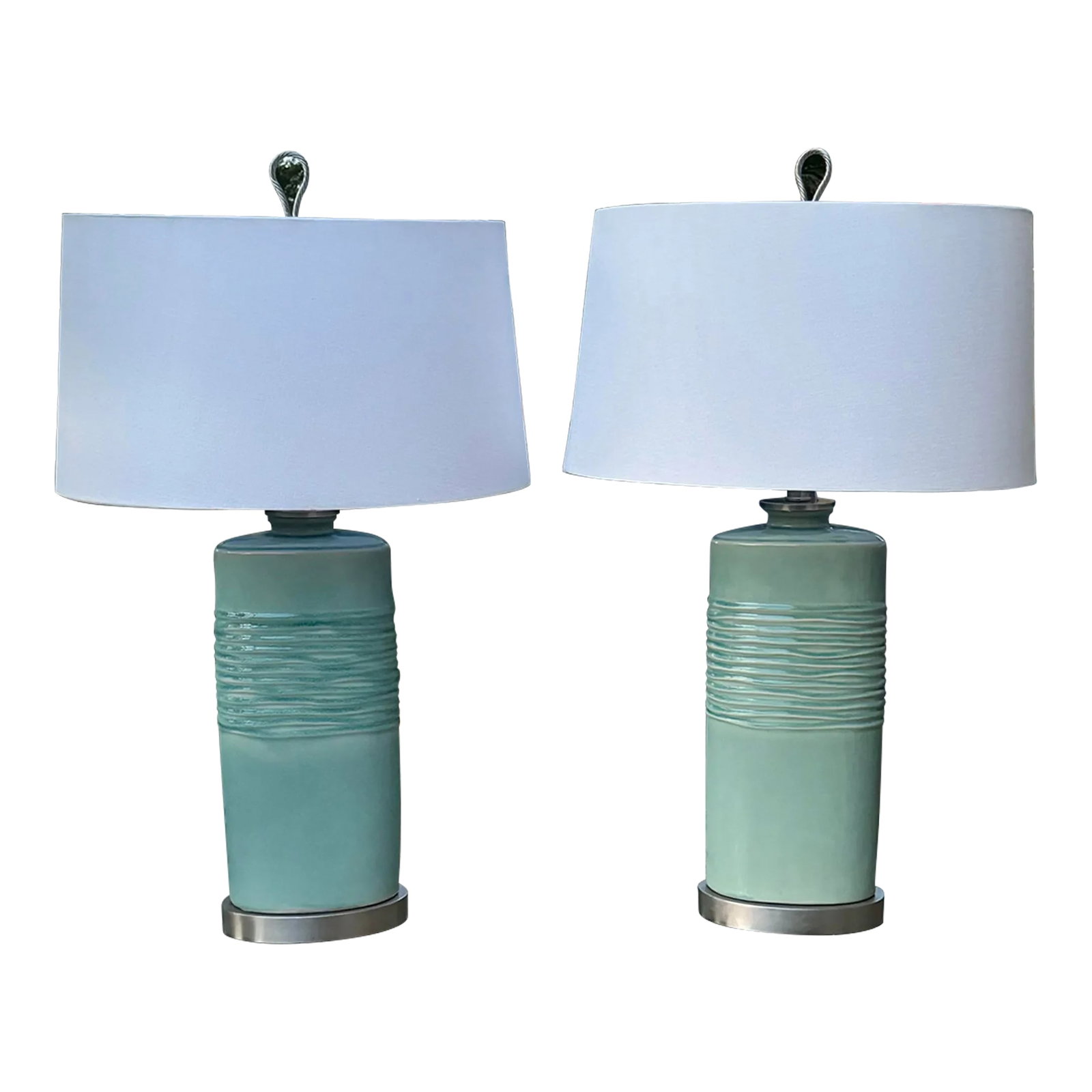 New Uttermost Lamps- a Pair: Rila 32 Inch 150 Watt Distressed Teal Glaze Table Lamps by Uttermost. The Ceramic Oval Column Base has a hand applied distressed finish with a teal glaze. Accented With Brushed Nickel Plated Details.