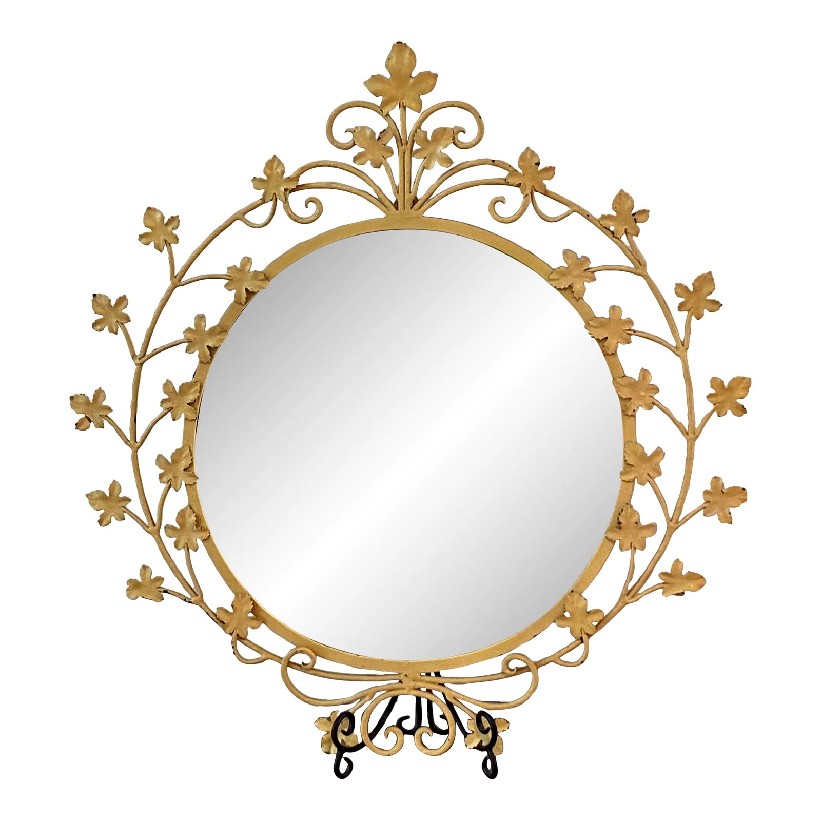 1933-1965 Mid-Century Modern "Ivy in Design" Round Wall Mirror: The period between 1933 and 1965 is considered to be the heart of the Mid-Century Movement. This beautiful metal Ivy in Design mirror is estimated to be from the 1950's. This piece is in the original