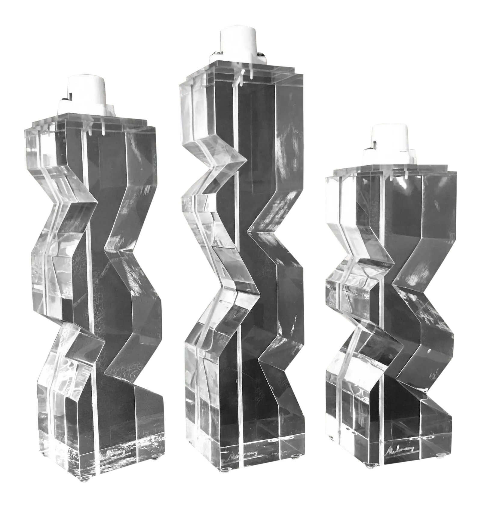 Vintage Brutalist Modern Signed Mulvany Set of 3 Lucite Column Shaped Table Lamps: Vintage midcentury modern signed mulvany set of 3 lucite sculptural table lamps. In fabulous condition. Gorgeous prism-like appearance that reflects light. Surface is smooth to the touch, crazing appe