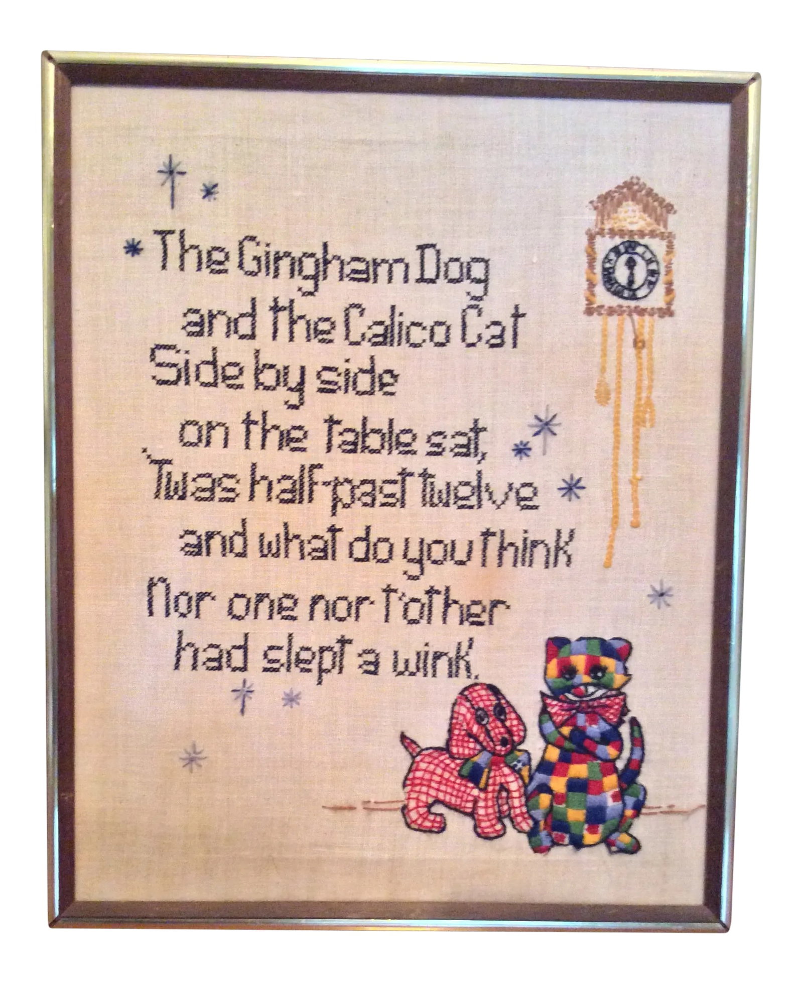 Mid Century Nursery Rhyme Cross Stitch: Adorable Mid-Century Nursery Rhyme Cross Stitch hand signed and dated by the artist on the back of the work. Framed in a vintage walnut colored frame accented by gold trim. This has just the perfect