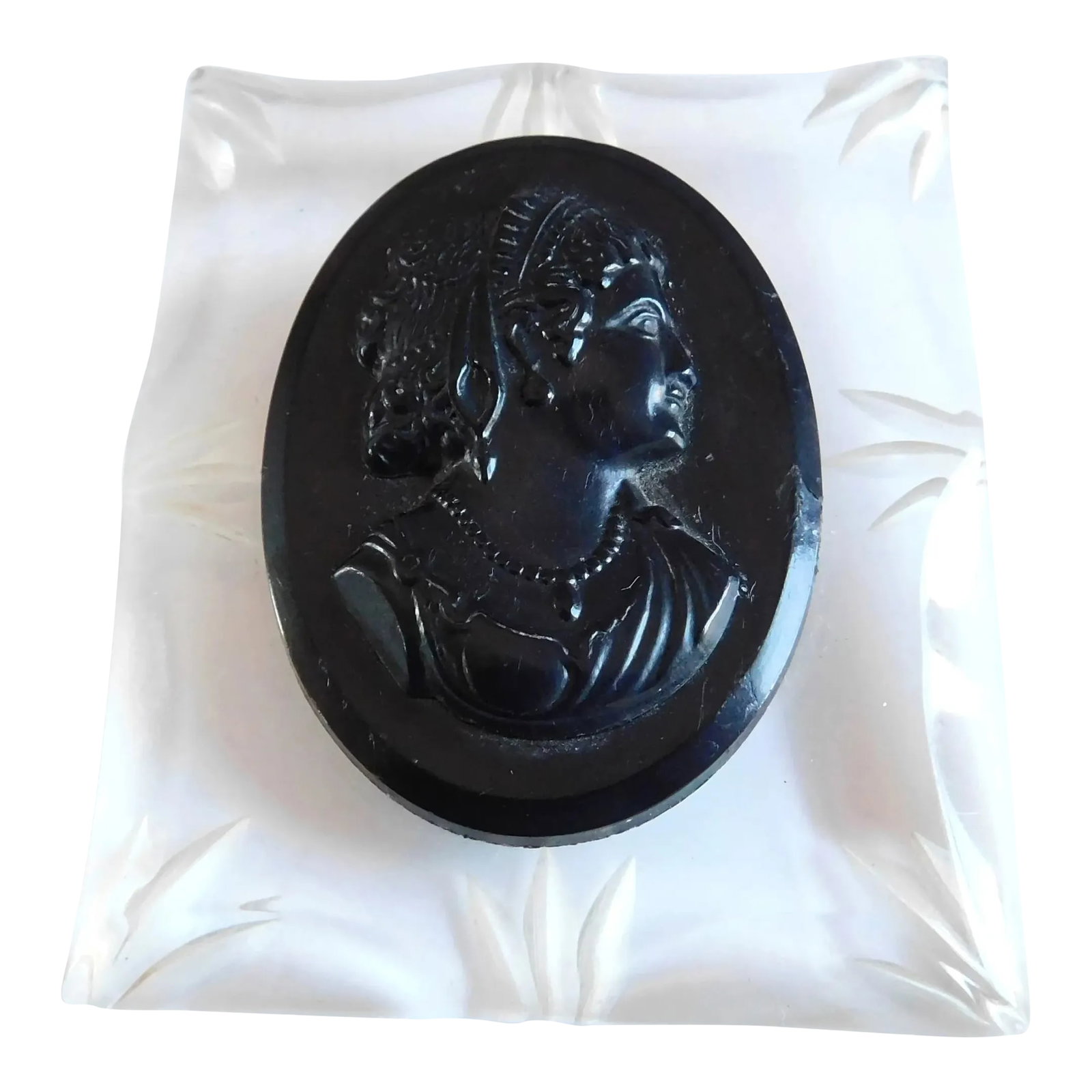 1920's Ebony and Clear Bakelite Profile Woman Cameo Brooch Pin: Black Ebony Woman Cameo Profile, on Clear Etched Border Base. The large rectangular 1920's Art Deco brooch pin measures 2.25 inches wide x 2.50 inches tall x .50 inches deep, with a safety catch on th