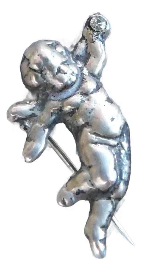 Antique Sterling Silver Cupid Pin With Bow and Arrow and Crystal: What better way to celebrate any day than gifting someone you love with this Small Sterling Silver Pin of Cupid, the Roman God of Love, complete with his bow and arrow and tiny crystal stone in his