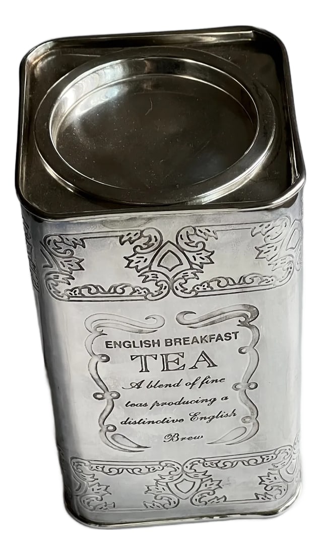 Silver-Plate Tea Canister With Etched Design and Details: Silver-plate tea canister with etched details. A fun piece for tea lovers to hold tea or other items. Condition: Alterations: Original Condition Unaltered Imperfections: Some Imperfections Condition N