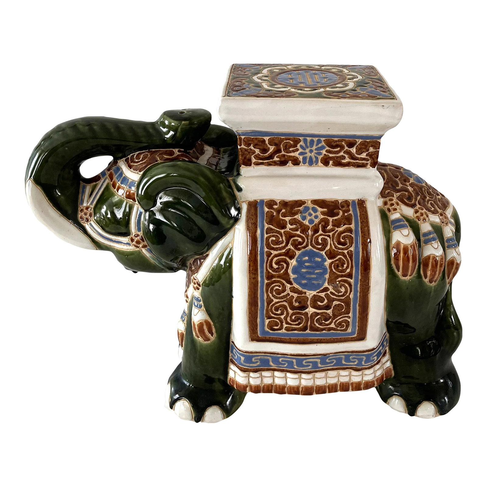 Mid Century Ceramic Elephant Garden Stool or Plant Stand: Mid century ceramic elephant stand that can be used as a small side table, garden stool or plant stand. Lovely blend of colors and great details.. A versatile and stylish piece suitable for use inside