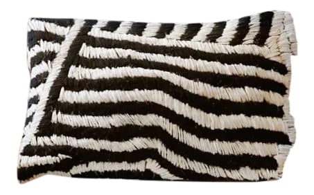 Moroccan Flat-Weave Boucherouite Lumbar Pillow in Black and White - 18: These bold and unique pillows are created from vintage flat-weave kilim Boucherouite rugs made from recycled materials. The word Boucherouite refers to the technique used to create these textiles