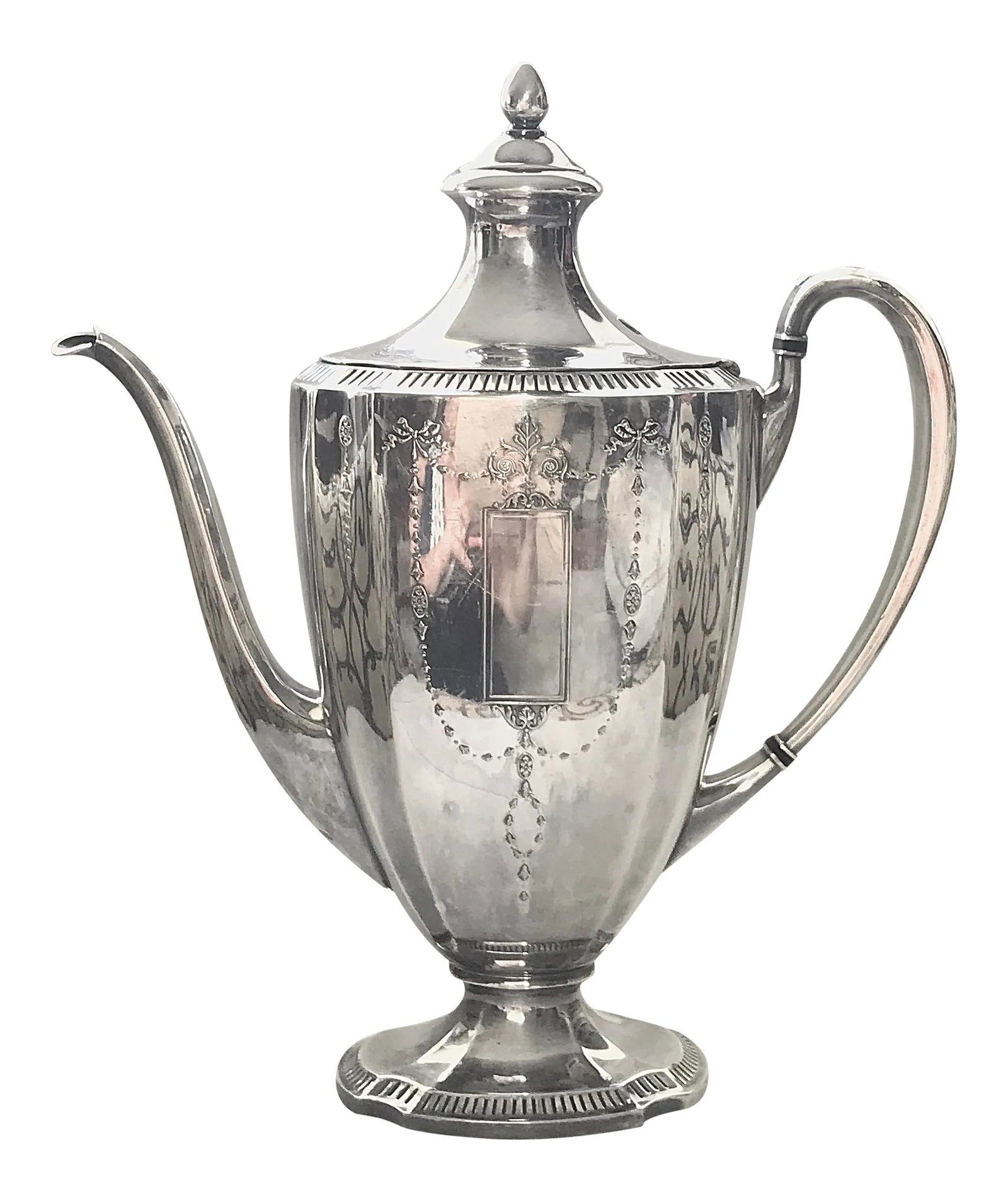 Antique Silver Plate Neoclassical Coffee Pot: This silver-plated coffee pot was made circa 1920 by the Community Plate Co. division of Oneida. The neoclassical pot is of tapered fused oval form on a shaped oval foot, both sides have an