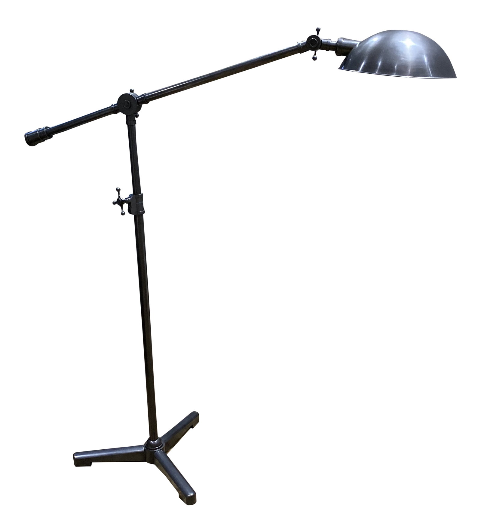 Thomas O'Brien Studio Pivoting Task Floor Lamp: This supremely functional floor lamp showcases the beauty of the utilitarian design. A master at the art of stylish task lighting, it's ideal for placing next to a sofa or reading chair, directing