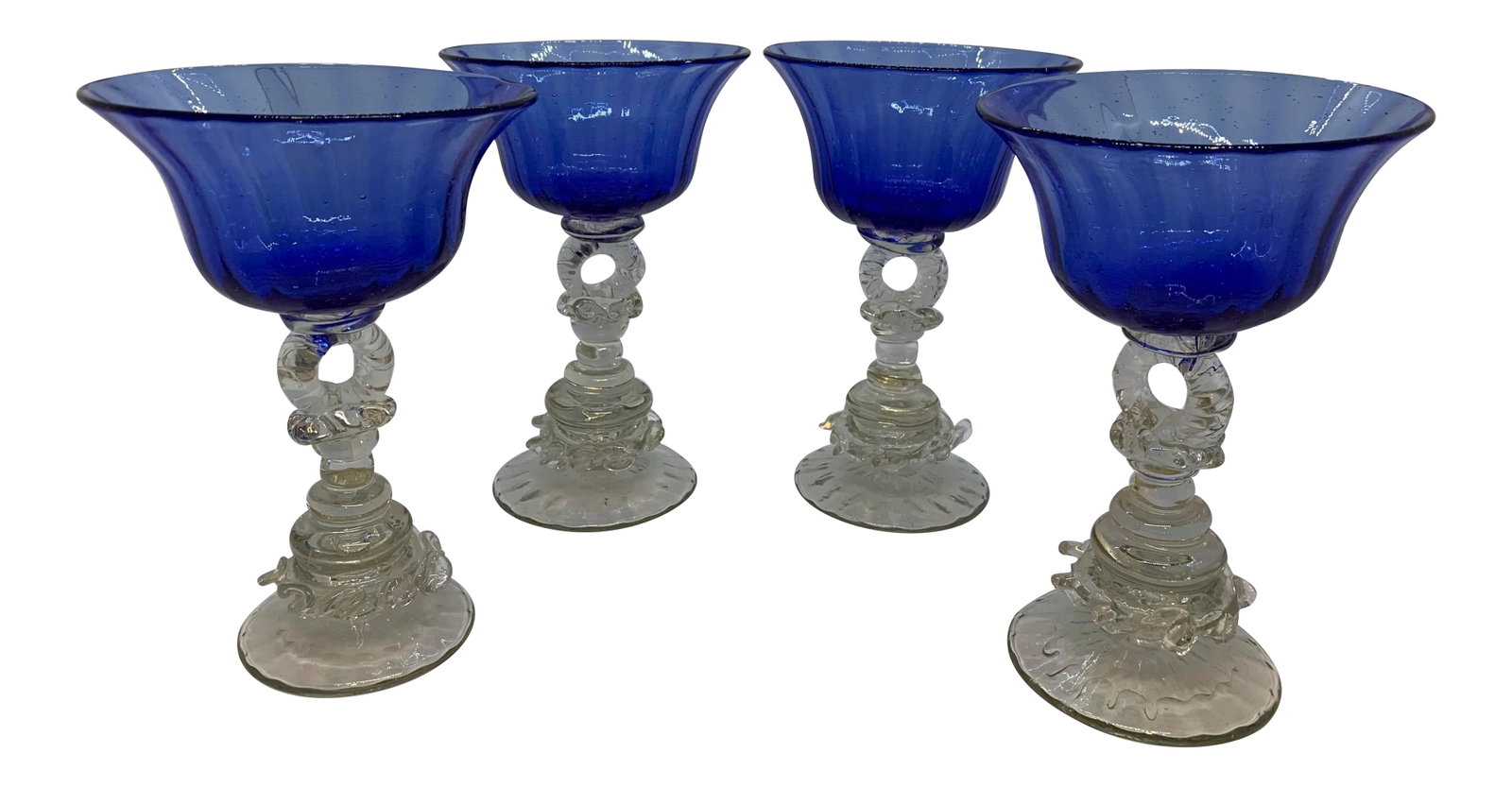 Vintage 1940s Hand Blown Cobalt Glasses - Set of 4: Wow these Vintage Hand Blown Cobalt Glasses Set of 4 are spectacular! So beautifully designed with an open circle stem and ruffle details on the base. The color is vivid and would be an elegant glass